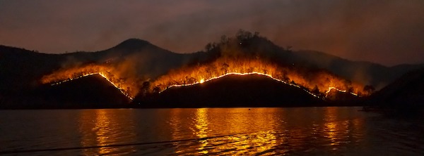 wildfire on mountain at night
